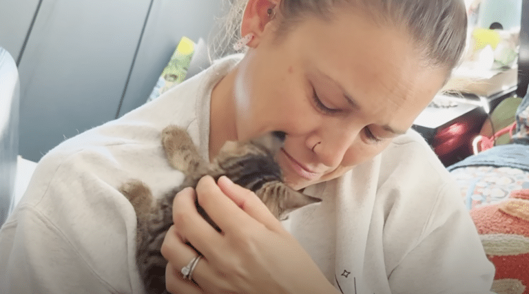 Athena plays with her new family